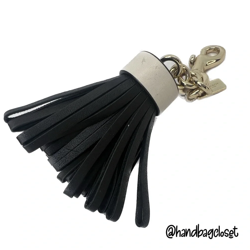 COACH LEATHER TASSEL BAG CHARM (F58505)
GOLD/BLACK KEY CHAIN KEYCHAIN - Picture 10 of 12